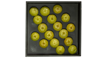 Amla fruit on Black box and white background