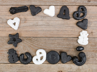 many different nice christmas cookies on wooden background photo taken from above