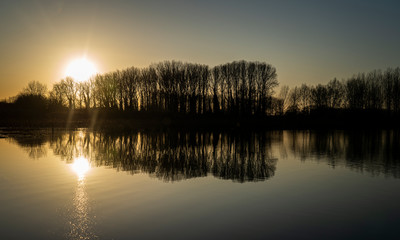 Fototapeta na wymiar Misty Sunrise in Fotheringhay along the River Nene