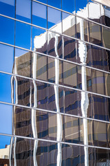 Reflections in glass building on Macquarie Street in the western suburb of Parramatta, Sydney, Australia