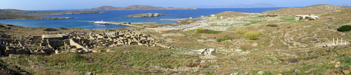 Fototapeta na wymiar Iconic and amazing archaeological site in uninhabited island of Delos, Cyclades, Greece