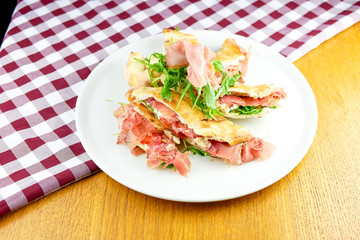 Pizza slices on a restaurant table