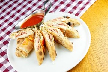 Pizza slices on a restaurant table