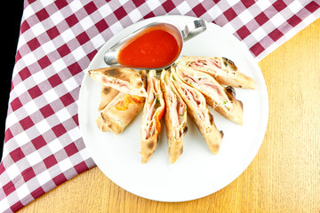 Pizza slices on a restaurant table