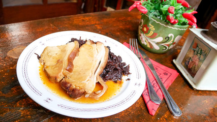 Pork dish on a restaurant table