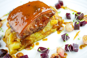 Pork dish on a restaurant table