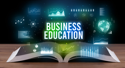 BUSINESS EDUCATION inscription coming out from an open book, creative business concept