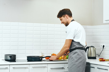 man in kitchen