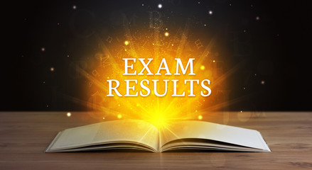 EXAM RESULTS inscription coming out from an open book, educational concept
