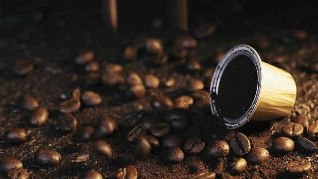 espresso coffee capsule on a wooden board