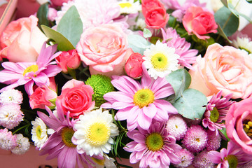 Obraz na płótnie Canvas Bright flowers bouquet background. Beautiful close-up of a flower arrangement.