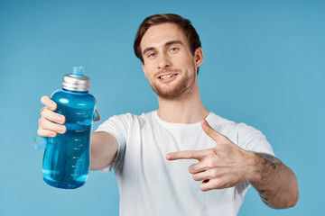 young man with bottle of water