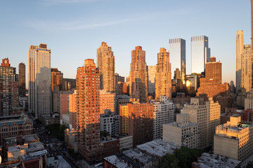 Fototapeta na wymiar Hell's Kitchen panorama skyline and the 8th Avenue at sunset, Midtown Manhattan, New York City