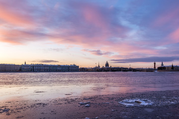 beautiful dawn with pink clouds over the Neva river