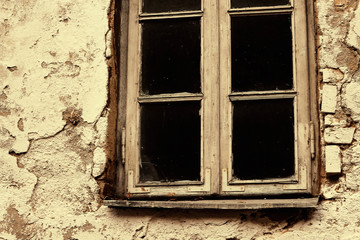 Old wooden frame window in old town building