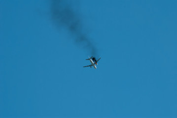 Passenger plane burns in the sky. Plane crash,