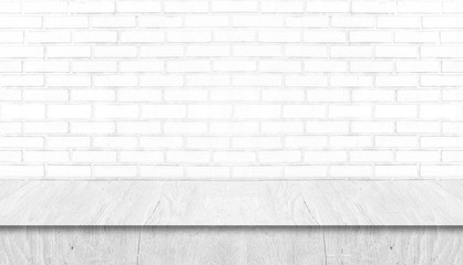 White wood table studio with white brick wall. Background for advertise product or web banner.