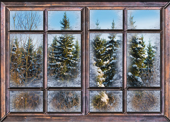 the window is covered with ice frost - Powered by Adobe