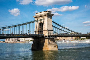 Obraz premium Budapest the Capital city of Hungary is divided by the River Danube.The Chain Bridge opened in 1849 was designed by UK engineer William Tierney Clark