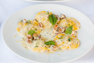 ravioli with mushrooms in a creamy sauce