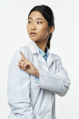 portrait of a female doctor isolated on white