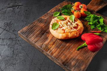 pizza  on wooden pizza board