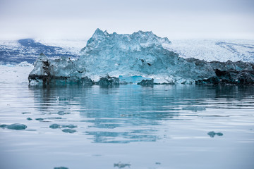 Fototapeta na wymiar Icebergs swimming on Jokulsarlon glacier lagoon in Iceland