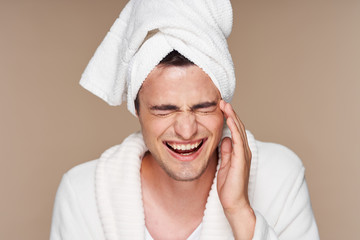 portrait of a man with towel on his head