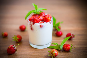 sweet homemade yogurt with fresh ripe strawberries