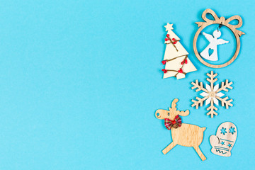 Fototapeta premium Top view of festive composition made of New Year decorations on colorful background. Merry Christmas concept with empty space for your design
