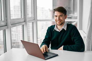 businessman working on laptop in office