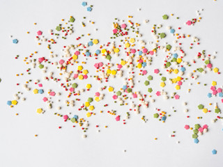 Colored sugar sprinkles background, Sugar sprinkle dots, decoration for cake and bakery, lot of sprinkles background