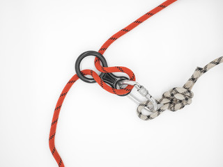 Figure Eight Descender or Belay device connected with carabiner and rope isolated on white background