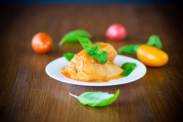 stuffed pepper with meat and vegetable sauce in a plate