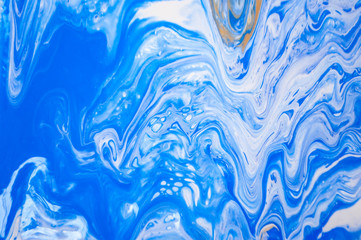 Obraz na płótnie Canvas Abstract colorful painting background made in fluid art technique. Blue and white fluid art background.