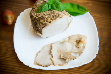 homemade baked meat with spices in a plate