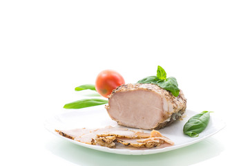 homemade baked meat with spices in a plate