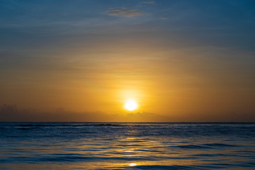 Fototapeta na wymiar Sunrise over the Indian Ocean on the island of Zanzibar, Tanzania, Africa