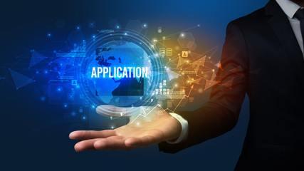 Elegant hand holding APPLICATION inscription, digital technology concept