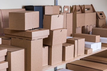 Lot of different cardboard carton boxes in the warehouse