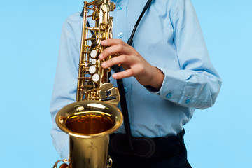 Fototapeta premium man playing saxophone