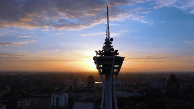 Aerial 4k footage of Alor Setar tower during sunrise. The Alor Setar Tower is 166 m tall and is the main telecommunications tower in the Malaysian state of Kedah.