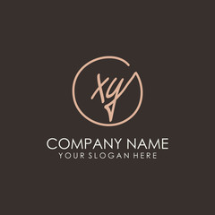 XY initials signature logo. Handwritten vector logo template connected to a circle. Hand drawn Calligraphy lettering Vector illustration.