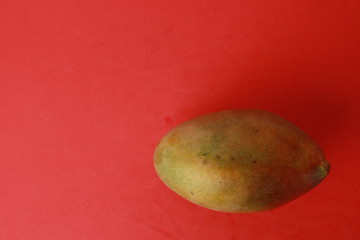 Delicious mango in colorful background