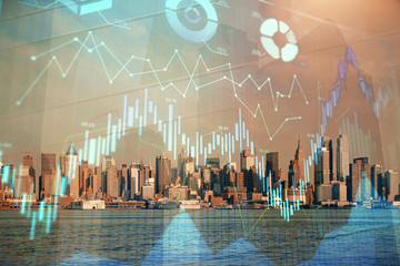 Forex chart on cityscape with skyscrapers wallpaper double exposure. Financial research concept.