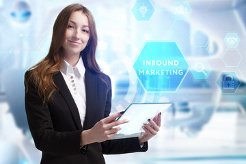 Business, Technology, Internet and network concept. Young businessman working on a virtual screen of the future and sees the inscription: Inbound marketing