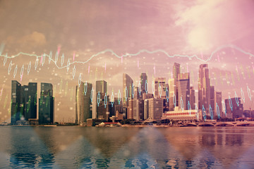 Forex chart on cityscape with tall buildings background multi exposure. Financial research concept.