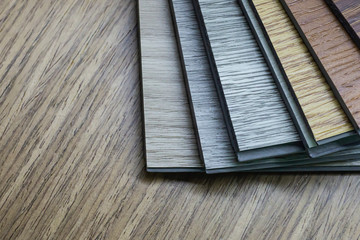 PVC Polymer Vinyl sample for customers to choose the floor design within the copy space .