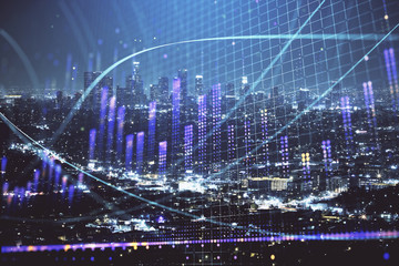 Naklejka na ściany i meble Financial graph on night city scape with tall buildings background multi exposure. Analysis concept.