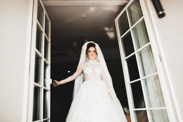 Beautiful luxury bride in elegant white dress